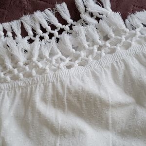 White tassled shower curtain